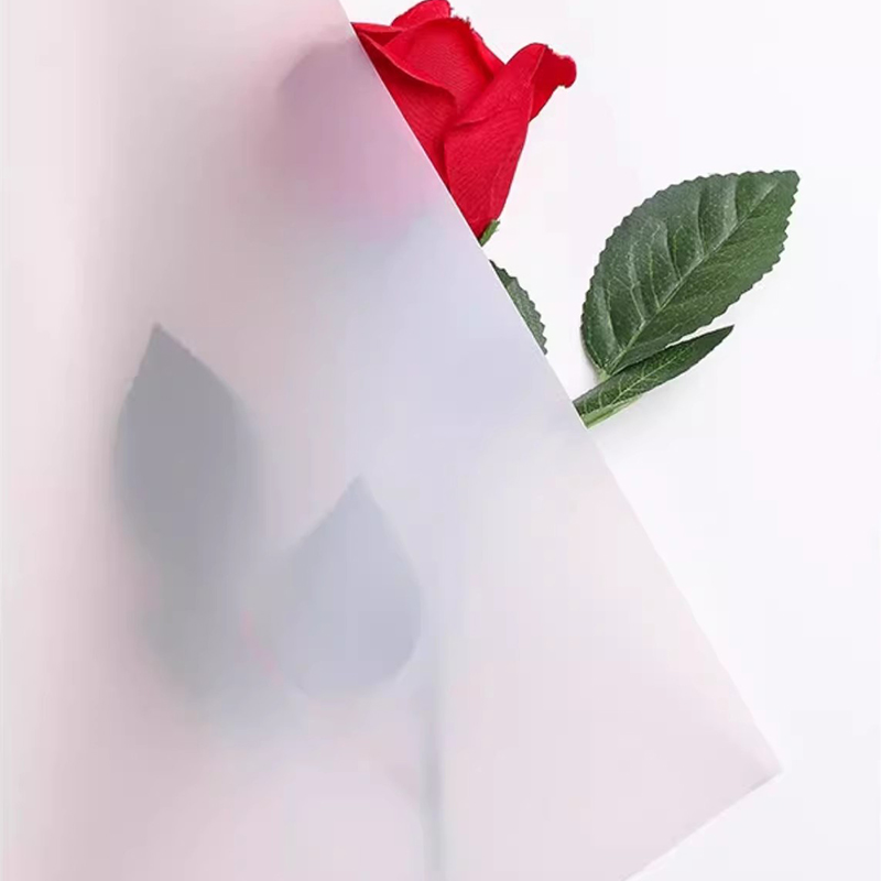 Mat ensfarvet gennemsigtigt blomsterindpakningspapir