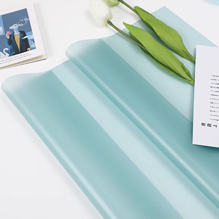 Mat ensfarvet gennemsigtigt blomsterindpakningspapir