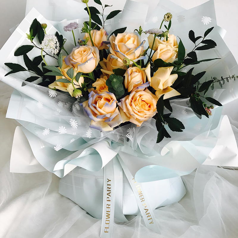 Ottefarvet ternet linje blomsterindpakningspapir
